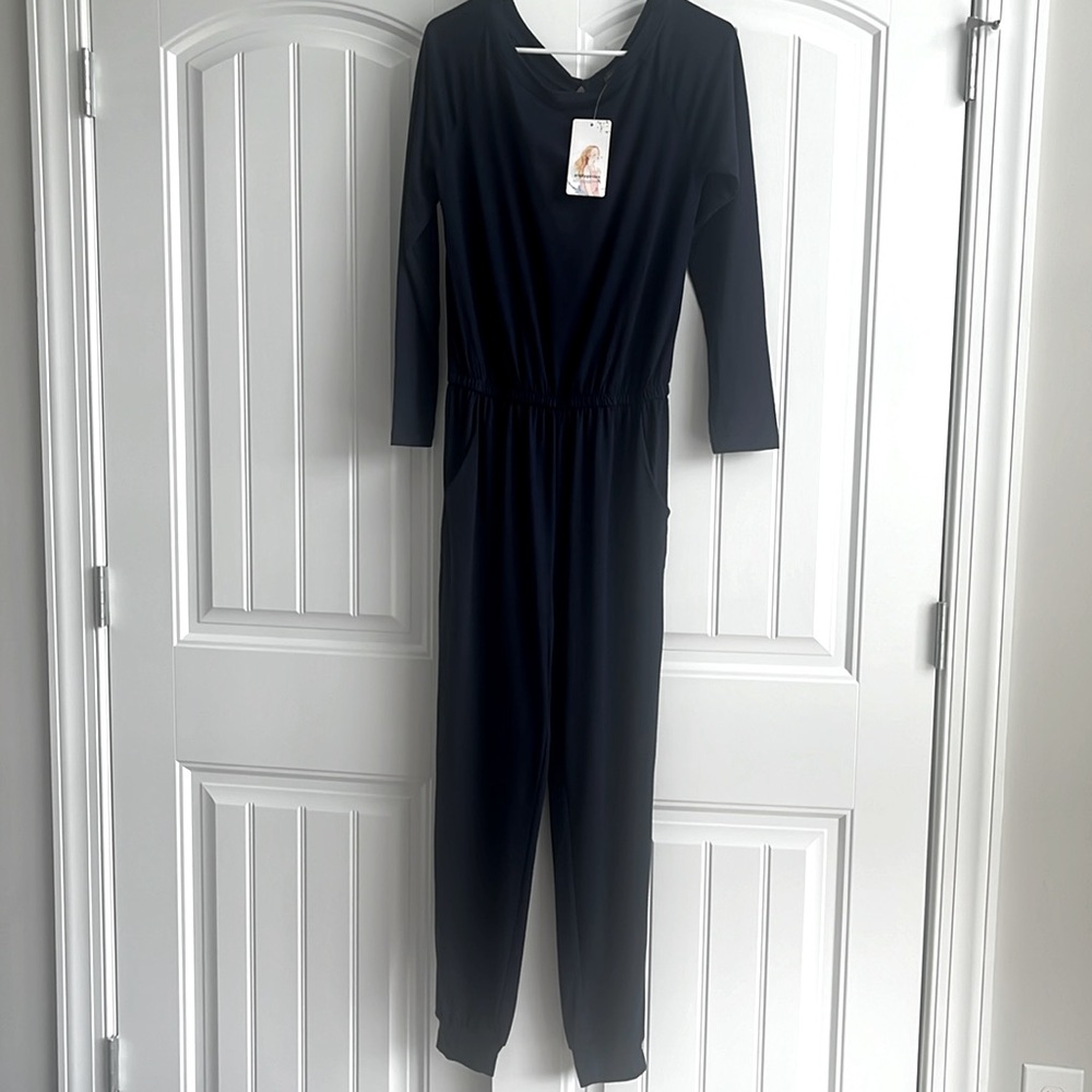 Closet close out!🎉New with Tags Navy  jumpsuit. 80% off retail. Final Price.